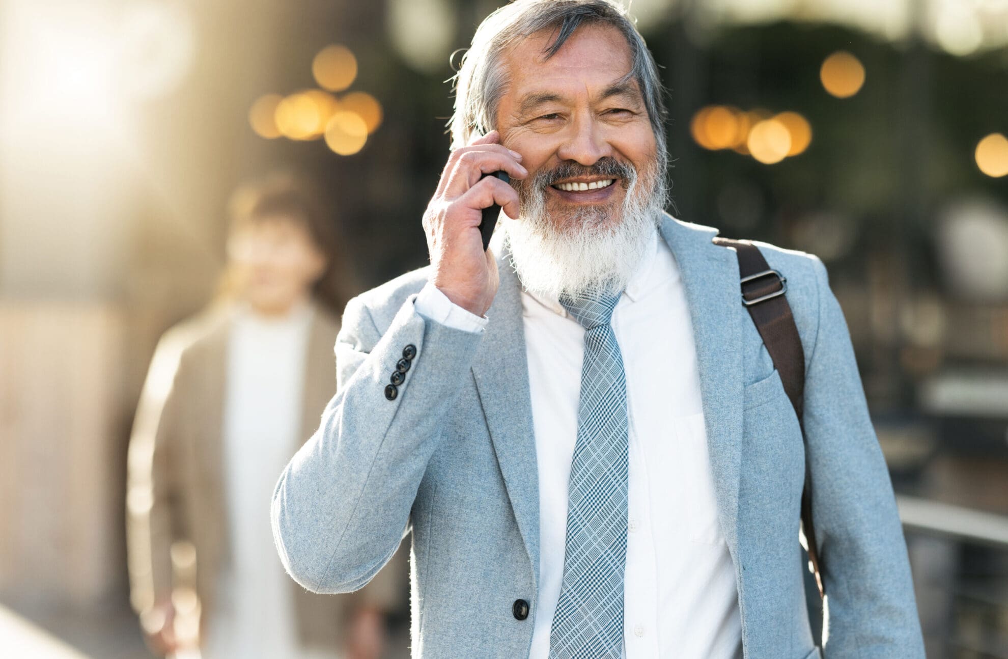 Management professional speaking on the phone