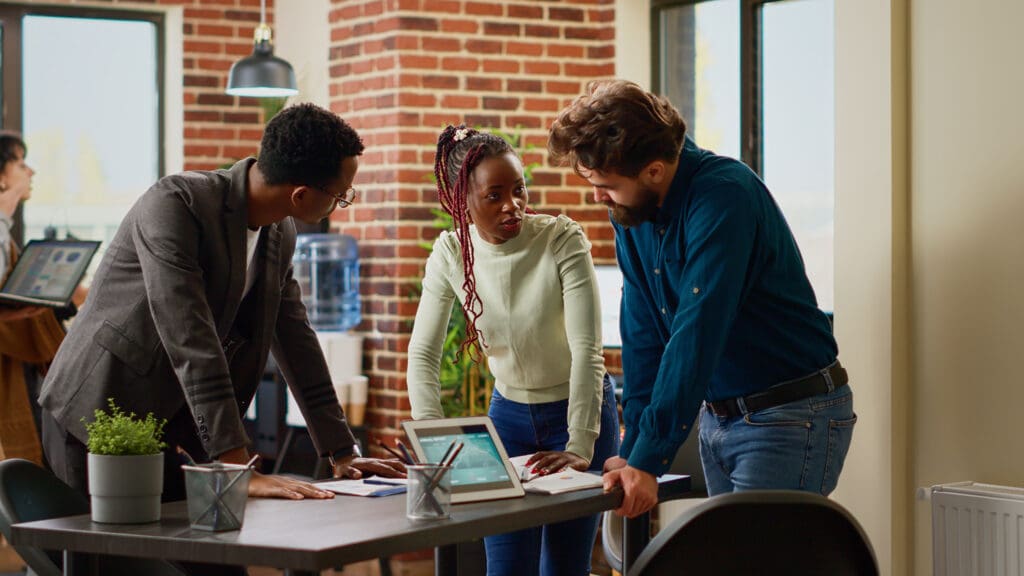 project management professionals discussing a project 