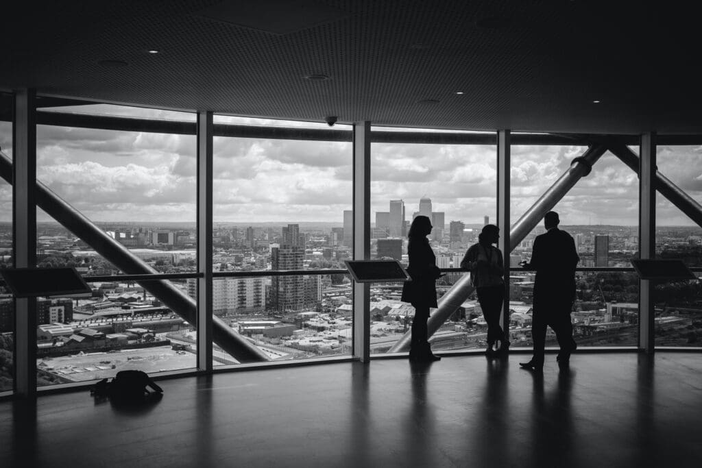 workers talking in business premises 