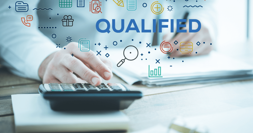 image with person using a calculator and the words"qualified" written across.
