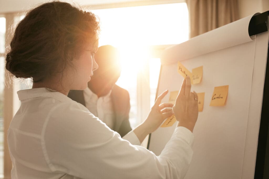 woman planning a project with team members