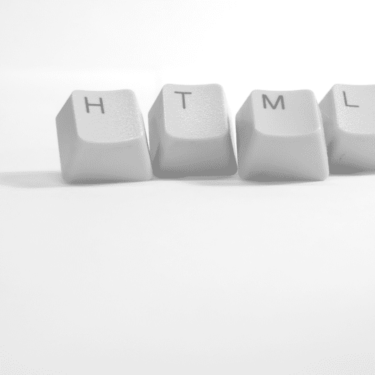 Image of keyboard keys that combine to read as "HTML"